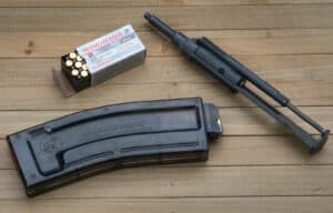 22LR AR-15 adapter on a picnic table