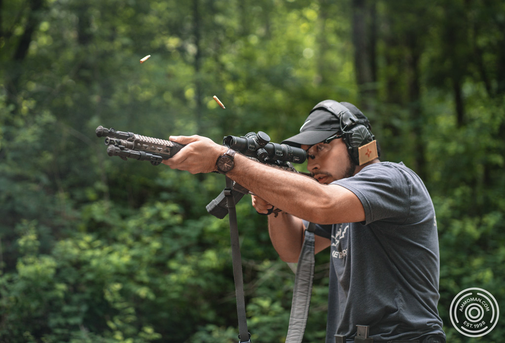 Man resisting recoil of .223 rapid fire. Felt recoil of .223