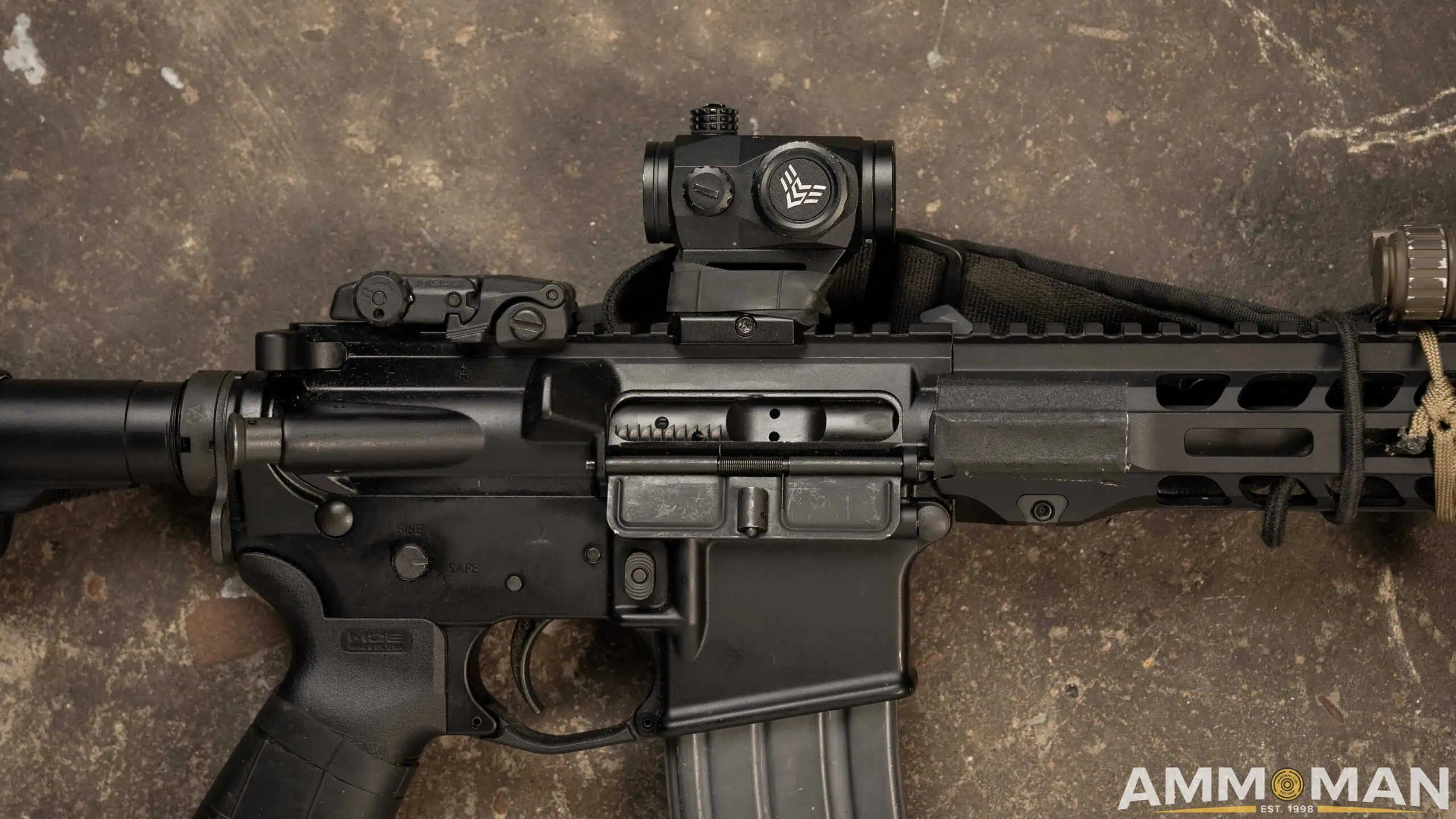 Building a budget AR15, equipped with a red dot sight.