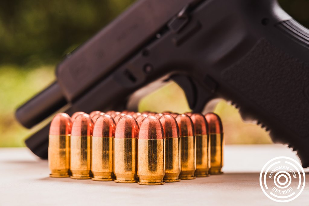 A Glock 45 GAP pistol and ammo at a shooting range