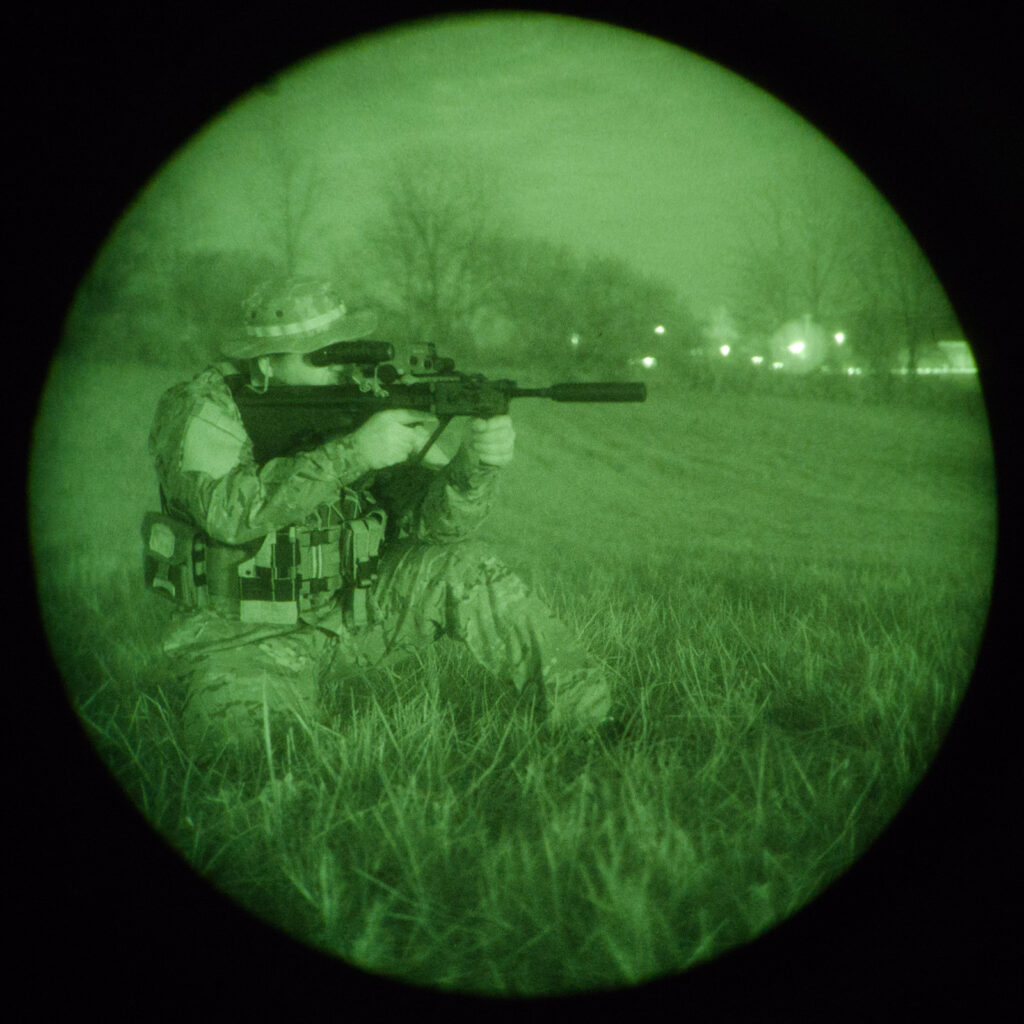 Night vision look A look at a rifleman through a night vision optic