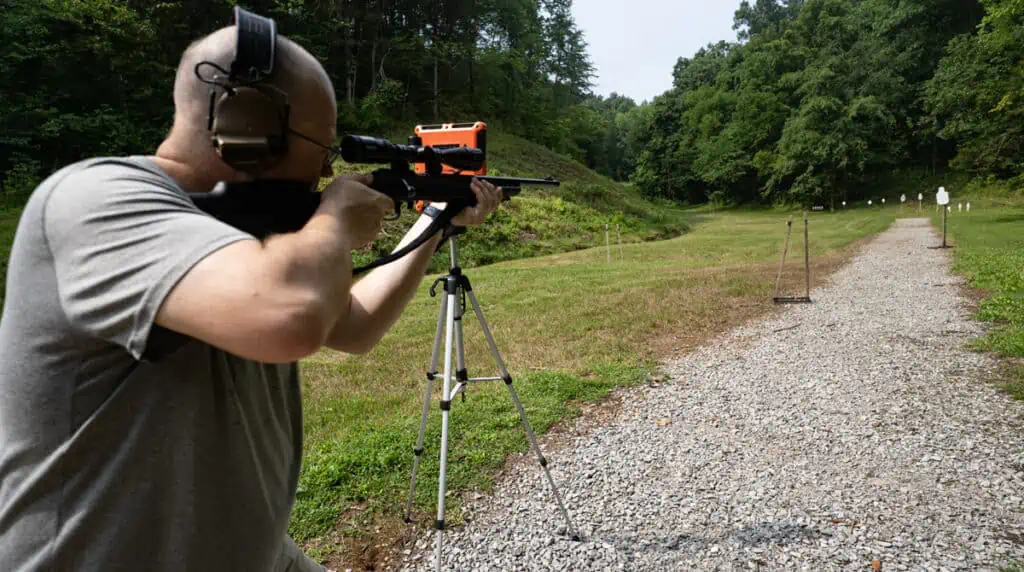Shooting 17 HMR with a chronograph at a shooting range