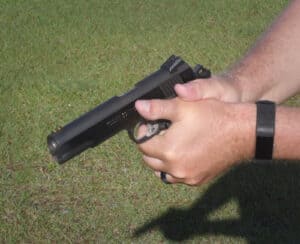 holding a pistol
