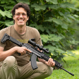 The author, Oleg Volk, with an AK-47