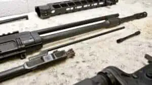 Gas piston AR-15 disassembled on a table