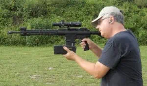 Performing a tactical reload with a rifle