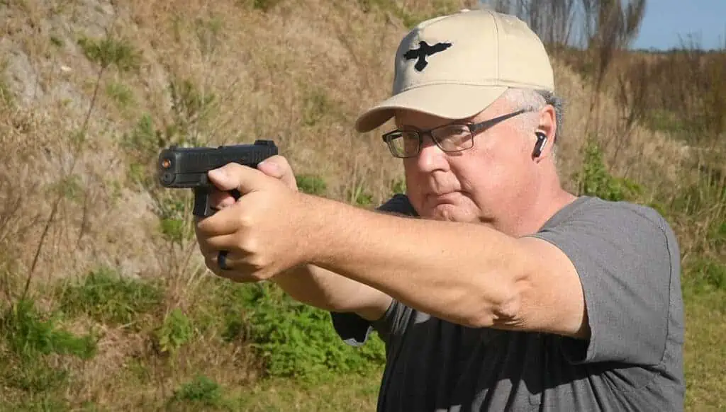 The author firing the Glock 44 at the range