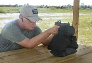 Pistol shooting from a bench